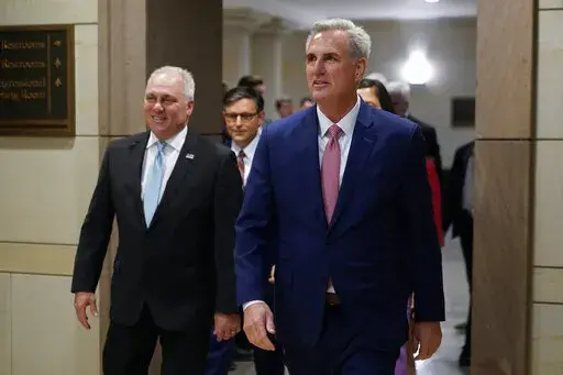 House Minority Leader Kevin McCarthy of Calif., right, and House Minority Whip Steve Scalise, R-La., arrive to speak with members of the press after a House Republican leadership meeting, Nov. 15, 2022, on Capitol Hill in Washington. McCarthy won the House Speaker nomination from his colleagues, while Scalise was voted majority leader. Even with their threadbare House majority, Republicans doubled down this week on using their new power to investigate the Biden administration and in particular t