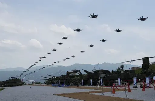 The South Korean army's drones fly during South Korea-U.S. joint military drills at Seungjin Fire Training Field in Pocheon, South Korea, Thursday, May 25, 2023. The South Korean and U.S. militaries held massive live-fire drills near the border with North Korea on Thursday, despite the North's warning that it won't tolerate what it calls such a hostile invasion rehearsal on its doorstep. (AP Photo/Ahn Young-joon)