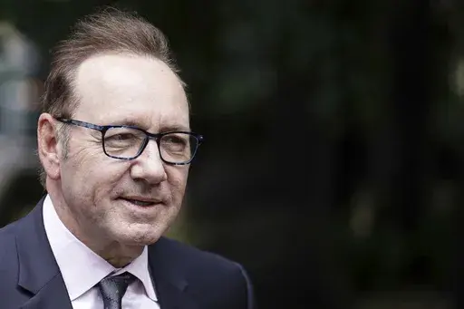 Actor Kevin Spacey arrives at Southwark Crown Court where he is accused of sexual offenses against four men in Britain, in London, Wednesday, July 5, 2023. The actor, charged under his full name of Kevin Spacey Fowler, has pleaded not guilty to all 12 counts, which relate to alleged incidents between 2001 and 2013. (Jordan Pettitt/PA via AP)