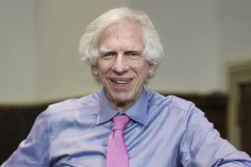 Judge Arthur Engoron poses for a picture in his courtroom in New York, Thursday, Sept. 28, 2023. Starting Monday, Oct. 2, Engoron will preside over a non-jury trial in Manhattan to resolve remaining claims in New York Attorney General Letitia James’ lawsuit against former President Donald Trump, his company and top executives. (AP Photo/Seth Wenig)