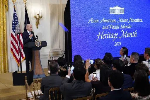 President Joe Biden speaks before a screening of the series "American Born Chinese" in the East Room of the White House in Washington, in celebration of Asian American, Native Hawaiian, and Pacific Islander Heritage Month, May 8, 2023. About 7 in 10 Asian American and Pacific Islanders in the United States believe the country is headed in the wrong direction and only about 1 in 10 believe democracy is working extremely or very well according to a new poll from AAPI Data and The Associated Press-