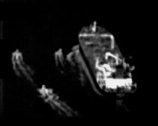 This still image taken from surveillance video from a U.S. Navy Boeing P-8 Poseidon shows three Iranian Revolutionary Guard fast-attack vessels near a commercial ship in the Strait of Hormuz Sunday, June 4, 2023. The U.S. Navy said Monday, June 5, its sailors and the United Kingdom Royal Navy came to the aid of a ship in the crucial Strait of Hormuz after Iran's Revolutionary Guard "harassed" it. Iran did not immediately acknowledge the incident. (U.S. Navy via AP)