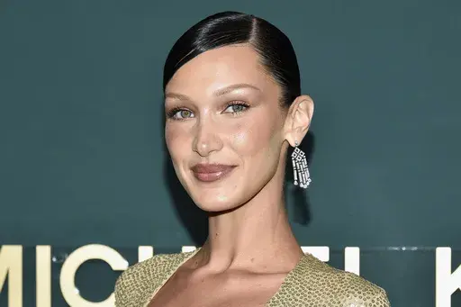 Bella Hadid attends the God's Love We Deliver 16th annual Golden Heart Awards at The Glasshouse on Monday, Oct. 17, 2022, in New York. Social media users shared a baseless claim that Dior has replaced supermodel, Bella Hadid with an Israeli model May Tager, due to Hadid’s recent comments on the latest Israel-Hamas war. But Hadid’s contract with the luxury fashion house ended in March 2022, a person close to the matter told The Associated Press.(Photo by Evan Agostini/Invision/AP)