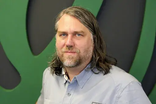 Chad Nackers, editor in chief of The Onion, appears in Chicago. Nackers started in 1997 as a photographer, earning $10 a photo. He began contributing jokes, became a writer and now runs it. (The Onion via AP)