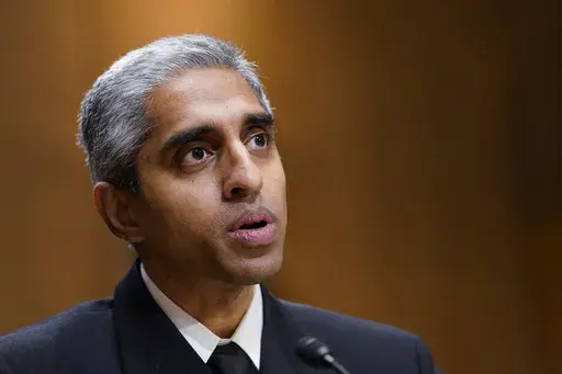 U.S. Surgeon General Dr. Vivek Murthy testifies before the Senate Finance Committee on Capitol Hill in Washington, on Feb. 8, 2022. The Surgeon General is warning there is not enough evidence to show that social media is safe for young people — and is calling on tech companies, parents and caregivers to take "immediate action to protect kids now." (AP Photo/Susan Walsh, File)