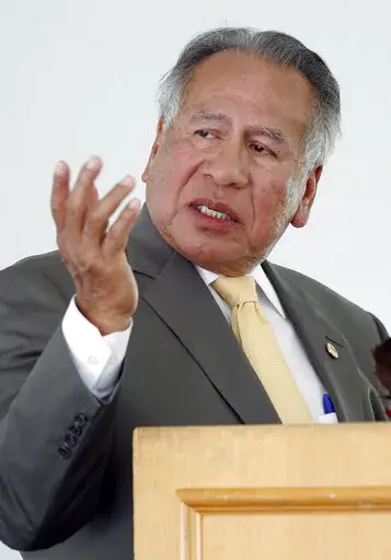 Sen. Enoch Kelly Haney speaks at the dedication of the Chickasaw Garden at Oklahoma City University in Oklahoma City, Sept. 6, 2011. Haney, a Native American artist, Seminole Nation chief and Oklahoma state lawmaker, has died at age 81. Haney’s death was announced Saturday, April 23, 2022 by Brian Palmer, assistant chief of the Seminole Nation. (AP Photo/Sue Ogrocki, file)