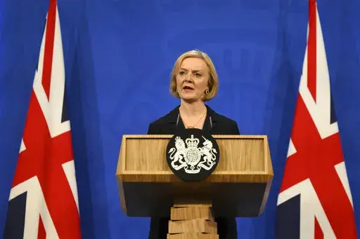 Britain's Prime Minister Liz Truss attends a press conference in the Downing Street Briefing Room in central London, Friday Oct. 14, 2022, following the sacking of the finance minister in response to a budget that sparked markets chaos. (Daniel Leal/Pool Photo via AP)