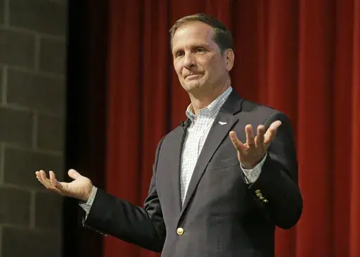 Republican U.S. Rep. Chris Stewart looks on during his town hall meeting on March 31, 2017, in Salt Lake City. Stewart is resigning from his seat in the narrowly divided U.S. House of Representatives. He said in a statement on Wednesday, May 31, 2023, that he had decided to retire due to his wife's health. (AP Photo/Rick Bowmer, File)