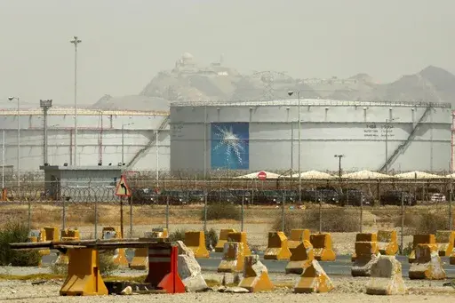 Storage tanks are seen at the North Jeddah bulk plant, an Aramco oil facility, in Jeddah, Saudi Arabia, on March 21, 2021. Saudi Arabia said Friday, May 31, 2024, it will sell a second sliver of stock in its state oil giant Aramco worth billions of dollars, its first tranche since its initial public offering back in 2019. (AP Photo/Amr Nabil, File)