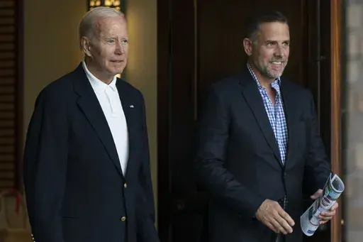 President Joe Biden and his son Hunter Biden leave Holy Spirit Catholic Church in Johns Island, S.C., after attending a Mass on Aug. 13, 2022. (AP Photo/Manuel Balce Ceneta, File)