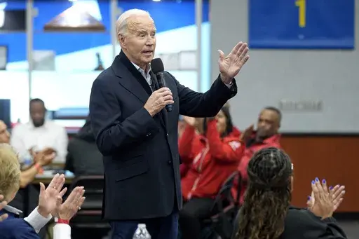 President Joe Biden meets with UAW members during a campaign stop at a phone bank in the UAW Region 1 Union Hall, Feb. 1, 2024, in Warren, Mich. (AP Photo/Evan Vucci)