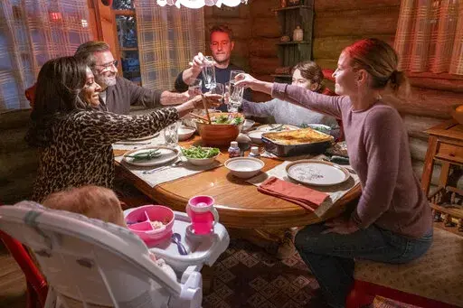 This image released by NBC shows, from left, Vanessa Bell Calloway as Edie, Griffin Dunne as Nicky, Justin Hartley as Kevin, Noah Salsbury Lipson as Matty, Jennifer Morrison as Cassidy, in a scene from "The Guitar Man" episode of "This Is Us." (Ron Batzdorff/NBC via AP)