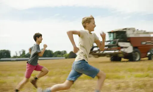 This image released by A24 shows Eden Dambrine, foreground right, and Gustav De Waele in a scene from "Close." (A24 via AP)