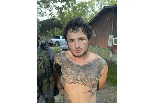 This photo provided by Hinds County Sheriff's office shows Corey Harrison taken into custody Thursday, May 4, 2023 in Crystal Springs, Miss. Harrison and three other inmates escaped from the Raymond Detention Center near Jackson, Mississippi’s capital, on April 22, officials said.(Hinds County Sheriff's office via AP)