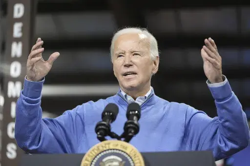 President Joe Biden speaks at the Earth Rider Brewery, Thursday, Jan. 25, 2024, in Superior, Wis. Biden is returning to the swing state of Wisconsin to announce $5 billion in federal funding for upgrading the Blatnik Bridge and for dozens of similar infrastructure projects nationwide. (AP Photo/Alex Brandon)