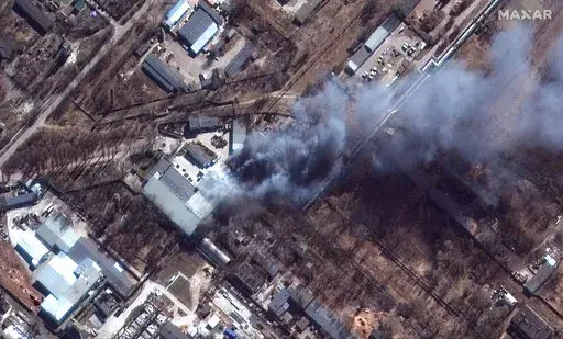 This satellite image provided by Maxar Technologies shows a closeup view of fires in an industrial area and nearby fields in southern Chernihiv, Ukraine, during the Russian invasion, Thursday, March 10, 2022. (Satellite image ©2022 Maxar Technologies via AP)