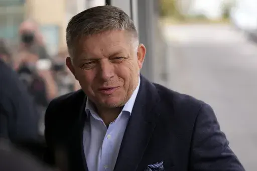 Chairman of SMER-Social Democracy party Robert Fico arrives at his party's headquarters day after an early parliamentary election in Bratislava, Slovakia, Sunday, Oct. 1, 2023. (AP Photo/Darko Bandic)