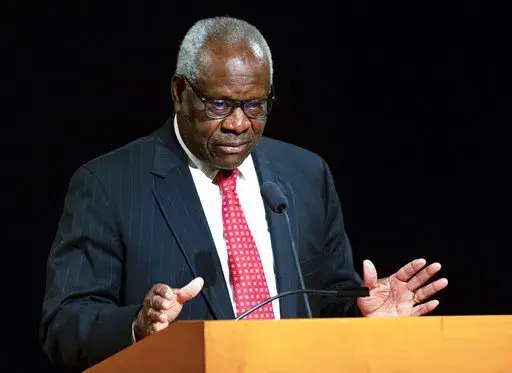 U.S. Supreme Court Associate Clarence Thomas speaks at the University of Notre Dame in South Bend, Ind., on Sept. 16, 2021. Thomas has been hospitalized because of an infection, the Supreme Court said Sunday, March 20, 2022. Thomas, 73, has been at Sibley Memorial Hospital in Washington, D.C., since Friday, March 18 after experiencing “flu-like symptoms,” the court said in a statement. (Robert Franklin/South Bend Tribune via AP, File)