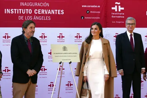 Spain's Queen Letizia attends the inauguration and plaque unveiling of The Instituto Cervantes in Los Angeles, Tuesday, Dec. 13, 2022. Luis García Montero, director of the Cervantes Institute, left, Queen Letizia, Santiago Cabanas, Spanish Ambassador to the United States. (AP Photo/Damian Dovarganes)
