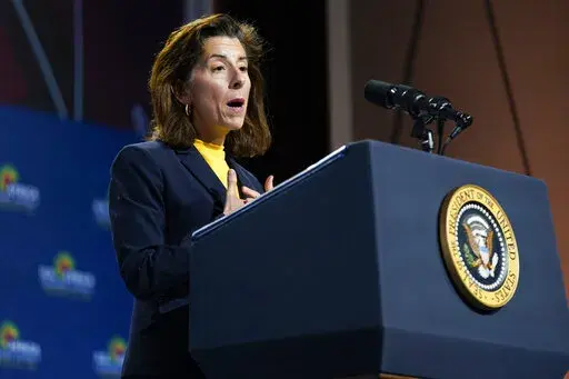 Commerce Secretary Gina Raimondo speaks before President Joe Biden to African leaders gathered for the U.S.-Africa Leaders Summit Dec. 14, 2022, in Washington. The government's $52 billion investment to develop advanced computer chips has become a rare source of bipartisan agreement. Senate Republican leader Mitch McConnell voted for it because of its importance for national security. But Raimondo says the U.S. needs a whole-of-society effort for the investments to succeed. (AP Photo/Patrick Sem