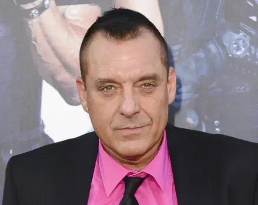 In this Aug. 11, 2014 file photo, actor Tom Sizemore arrives at the premiere of "The Expendables 3" in Los Angeles. Sizemore is in critical condition after suffering a brain aneurism, a representative for the actor said Sunday, Feb. 19, 2023. Sizemore suffered the aneurism around 2 a.m. Saturday at his home in Los Angeles, and is hospitalized. (Photo by Jordan Strauss/Invision/AP, File)