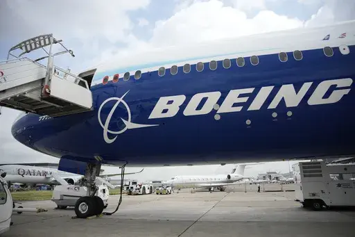 The Boeing 777X airplane is shown at the Paris Air Show in Le Bourget, north of Paris, France, on June 19, 2023. Boeing said Wednesday, July 31, 2024, that aerospace industry veteran Robert "Kelly" Ortberg will take over as CEO next week, replacing David Calhoun. Boeing is announcing the new CEO as it reports a loss of more than $1.4 billion in the second quarter. (AP Photo/Lewis Joly, File)