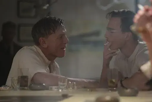 This image released by A24 shows Daniel Craig, left, and Drew Starkey in a scene from "Queer." (Yannis Drakoulidis/A24 via AP)