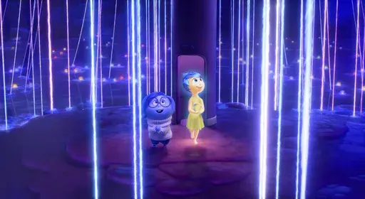 This image released by Disney/Pixar shows, from left, Sadness, voiced by Phyllis Smith, left, and Joy, voiced by Amy Poehler, in a scene from "Inside Out 2." (Disney/Pixar via AP)