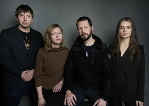 Photographer Evgeniy Maloletka, from left, "Frontline" producer/editor Michelle Mizner, director Mstyslav Chernov, and field producer Vasilisa Stepanenko pose for a portrait to promote the film "20 Days in Mariupol" at the Latinx House during the Sundance Film Festival on Sunday, Jan. 22, 2023, in Park City, Utah. The film is a joint project between The Associated Press and PBS "Frontline." (Photo by Taylor Jewell/Invision/AP, File)