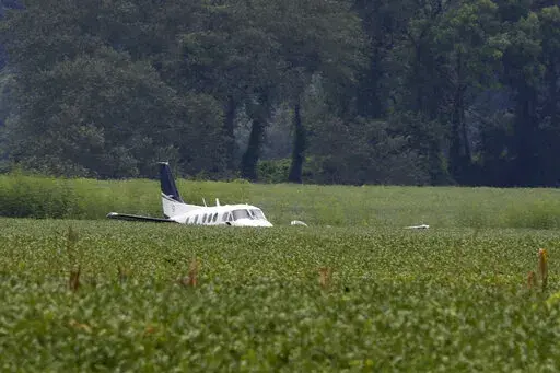 A stolen airplane rests in a field of soybeans after crash-landing near Ripley, Miss., on Sept. 3, 2022. Cory Wayne Patterson, 29, an airport worker who flew a stolen plane erratically over north Mississippi and threatened to crash into a Walmart in September, has died Monday, Nov. 14, 2022, in a federal prison in Miami, where he was being held while awaiting trial. (AP Photo/Nikki Boertman, File)