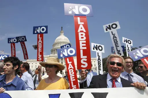 John Holman, of Denver, Colo., right, and others with the group "No Labels" take part in a rally on Capitol Hill in Washington, July 18, 2011. North Carolina voters could have another presidential ticket to choose from in 2024 now that state election officials have formally granted the “No Labels” movement a spot on the ballot. The State Board of Elections voted 4-1 on Sunday, Aug. 13, 2023, to recognize the No Labels Party as an official North Carolina party following a successful petition 