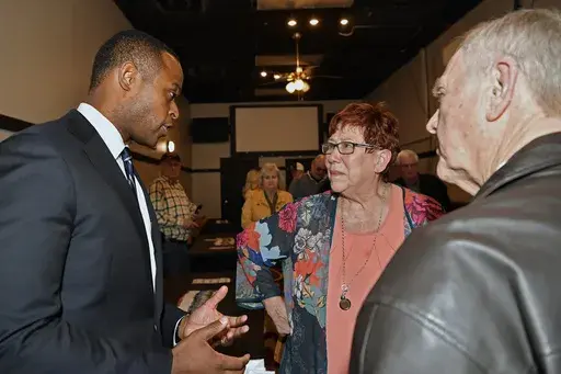 Kentucky Attorney General and Kentucky gubernatorial candidate Daniel Cameron speaks with supporters during a campaign stop in Richmond, Ky., May 3, 2023. The Kentucky Republican gubernatorial primary is being held on Tuesday, May 16. (AP Photo/Timothy D. Easley, File)
