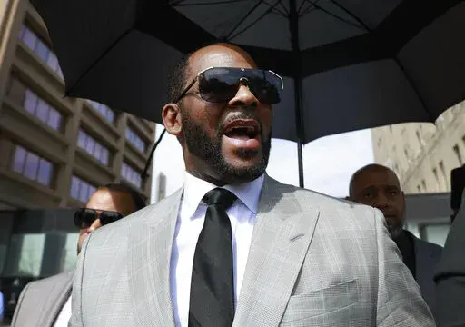 Musician R. Kelly leaves the Leighton Criminal Court building in Chicago on June 6, 2019. Kelly’s federal trial starts Monday in Chicago. (AP Photo/Amr Alfiky, File)