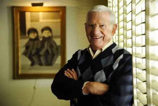 Actor, artist and singer Robert Clary poses for a portrait in his home studio on Feb. 26, 2014, in Beverly Hills, Calif.  Clary, who played a prisoner of war in the TV sitcom “Hogan’s Heroes,” died  Wednesday of natural causes at his home in Beverly Hills, Calif. He was 96.  (Photo by Chris Pizzello/Invision/AP, File)