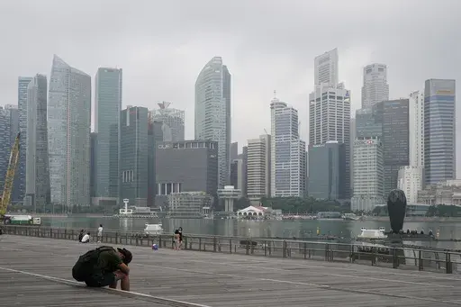The central business district is shrouded by haze in Singapore, on Sept. 23, 2019. Singapore conducted its first execution of a woman in 19 years on Friday, July 28, 2023, and its second hanging this week for drug trafficking despite calls for the city-state to cease capital punishment for drug-related crimes. (AP Photo/Vincent Thian, File)