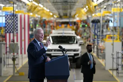 President Joe Biden speaks during a visit to the General Motors Factory ZERO electric vehicle assembly plant, Nov. 17, 2021, in Detroit. The Biden administration this week is expected to announce new automobile emissions standards that relax proposed limits in the next few years but reach the same strict standards outlined by the Environmental Protection Agency last year. (AP Photo/Evan Vucci, File)