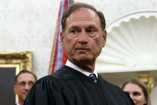 Supreme Court Justice Samuel Alito pauses after swearing in Mark Esper as Secretary of Defense during a ceremony with President Donald Trump in the Oval Office at the White House in Washington, July 23, 2019. Nine days after The New York Times reported about the political symbolism of an upside-down American flag that flew at U.S. Supreme Court Justice Samuel Alito's home, the Washington Post acknowledged May 25, 2024, that it had the same story more than three years ago and decided not to publi