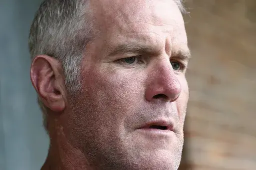 Former NFL quarterback Brett Favre speaks to the media, Oct. 17, 2018, in Jackson, Miss. The deposition hearing for the civil lawsuit against Favre in Mississippi's welfare scandal has been pushed back at the request of the athlete's attorneys, a court document filed Friday, Oct. 6, 2023, shows. (AP Photo/Rogelio V. Solis, File)