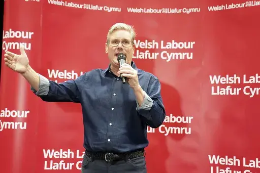 Labour Party leader Sir Keir Starmer addresses a Welsh Labour reception at the Labour Party Conference in Liverpool, England, Sunday, Oct. 8, 2023. (Stefan Rousseau/PA via AP)
