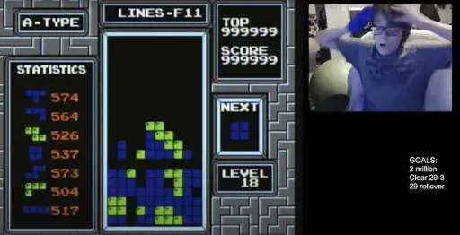 In this image taken from video, 13-year-old player named Willis Gibson reacts after playing a game of Tetris. Gibson, who in late December became the first player to officially “beat” the original Nintendo version of the game. By breaking it, of course. Technically, Gibson — aka “blue scuti” in the gaming world — made it to what gamers call a “kill screen,” a point where the Tetris code glitches, crashing the game. (Willis Gibson via AP)
