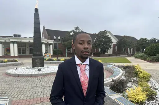 Chad Preston, a senior political science major at Florida AM University, poses for a photo before class on Sept. 27, 2023 in Tallahassee, Fla. A core mission of Florida A&M University from its founding over a century ago has been to educate African Americans. It was written into the law that established the school along with another college, in Gainesville, reserved for white students. At Florida's only public HBCU, some students now fear political constraints might get in the way of teaching pa