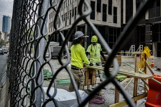 Construction workers work with rebar at a site on Tuesday June 6, 2023, in New York. On Friday, The U.S. government issues the June jobs report. (AP Photo/Bebeto Matthews, File)