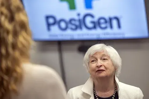 Secretary of the Treasury Janet Yellen listens to staff of PosiGen, a leading solar energy company in Kenner, La., as she hears how people can save money using solar power, Friday, June 30, 2023 in New Orleans. Yellen talked about how the Inflation Reduction Act is helping drive a manufacturing boom and helping lower costs for consumers. (Chris Granger/The Times-Picayune/The New Orleans Advocate via AP)