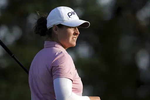 USA's Ally Ewing tees off the 18th during day one of the 2023 AIG Women's Open at Walton Heath, Surrey, England, Thursday, Aug. 10, 2023. (John Walton/PA via AP)