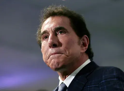 Casino mogul Steve Wynn pauses at a news conference in Medford, Mass., on March 15, 2016. Wynn's long legal fight with Nevada gambling regulators over claims of workplace sexual misconduct is expected to end Thursday, July 27, 2023, with a settlement calling for him to pay a $10 million fine and cut virtually all ties to the industry he helped shape in Las Vegas. (AP Photo/Charles Krupa, File)