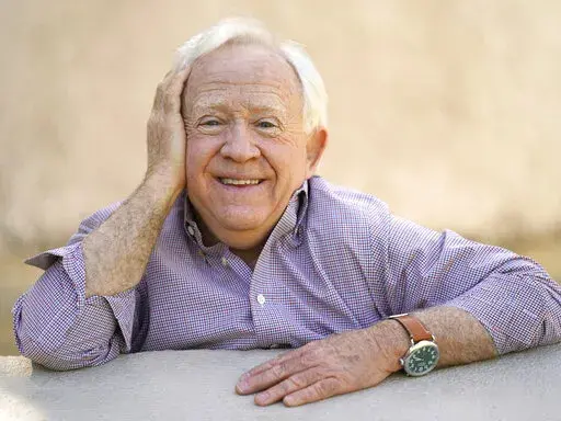 Leslie Jordan poses for a portrait at Pan Pacific Park in the Fairfax district of Los Angeles on Thursday, April 8, 2021 to promote his new book "How Y'all Doing?: Misadventures and Mischief from a Life Well Lived." Jordan, the Emmy-winning actor whose wry Southern drawl and versatility made him a comedy and drama standout on TV series including “Will & Grace” and “American Horror Story,” has died. He was 67. (AP Photo/Damian Dovarganes, File)