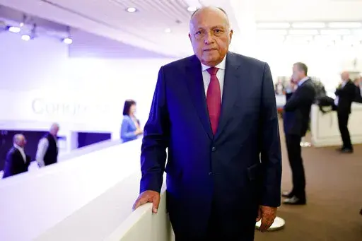 Egyptian Minister of Foreign Affairs Sameh Shoukry poses for media after an interview with the Associated Press at the World Economic Forum in Davos, Switzerland, Monday, May 23, 2022. The annual meeting of the World Economic Forum is taking place in Davos from May 22 until May 26, 2022. (AP Photo/Markus Schreiber)