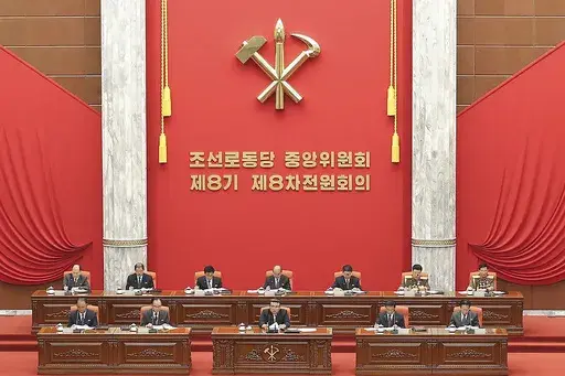 In this photo provided by the North Korean government, North Korean leader Kim Jong Un, bottom center on stage, attends an enlarged plenary meeting of the ruling Workers’ Party’s Central Committee at the party's headquarters in Pyongyang, North Korea, Friday, June 16, 2023. Independent journalists were not given access to cover the event depicted in this image distributed by the North Korean government. The content of this image is as provided and cannot be independently verified. Korean lan