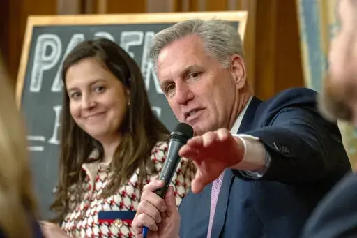 Speaker of the House Kevin McCarthy, of Calif., right, speaks about the proposed legislation dubbed the "Parents Bill of Rights," Wednesday, March 1, 2023, next to Rep. Elise Stefanik, R-N.Y., on Capitol Hill in Washington. (AP Photo/Jacquelyn Martin)