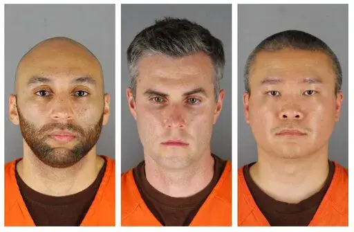 This combination of photos provided by the Hennepin County Sheriff's Office in Minnesota on June 3, 2020, shows, from left, former Minneapolis police officers J. Alexander Kueng, Thomas Lane and Tou Thao. The former policer officers are on trial in federal court accused of violating Floyd's civil rights as fellow Officer Derek Chauvin killed him. Judge Paul Magnuson abruptly recessed on Wednesday, Feb. 2, 2022 after one of the defendants tested positive for COVID-19. (Hennepin County Sheriff's O